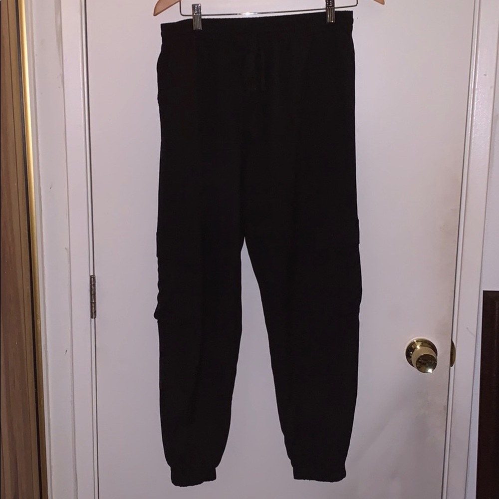 Black stretchy pants with cargo pockets